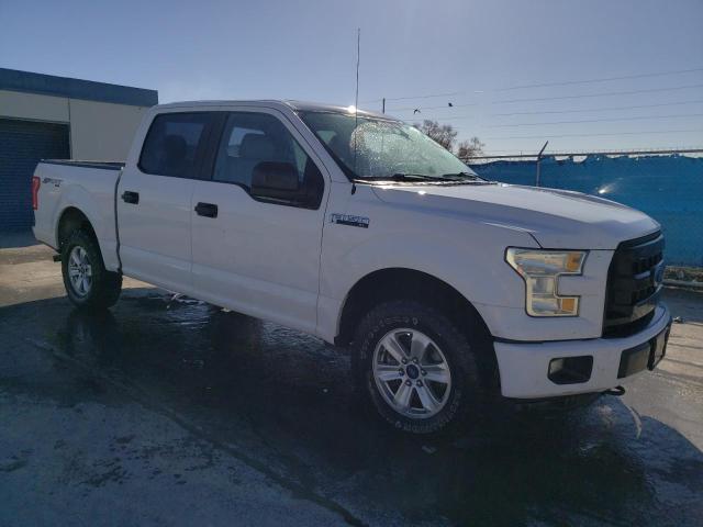 1FTEW1E87FFA02469 - 2015 FORD F150 SUPERCREW WHITE photo 4