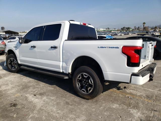 1FTVW1EL6PWG38726 - 2023 FORD F150 LIGHTNING PRO WHITE photo 2