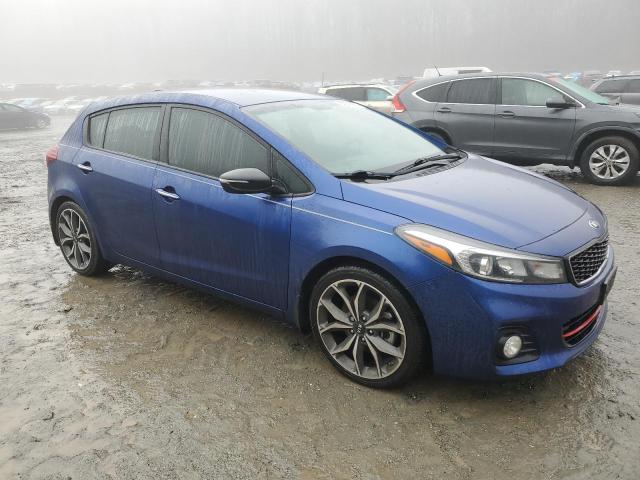 3KPFN5A34JE194316 - 2018 KIA FORTE EX BLUE photo 4