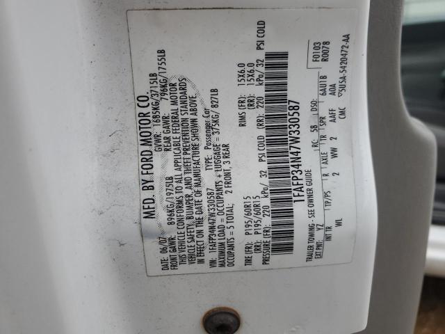 1FAFP34N47W330587 - 2007 FORD FOCUS ZX4 WHITE photo 12