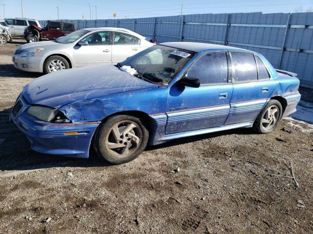 1G2NW55M2RC814258 - 1994 PONTIAC GRAND AM GT BLUE photo 1