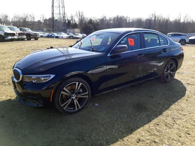 3MW5R7J08M8C12821 - 2021 BMW 330XI أسود صورة 1