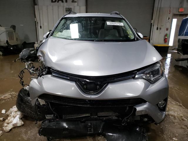 JTMDJREV9HD091135 - 2017 TOYOTA RAV4 HV LIMITED SILVER photo 5