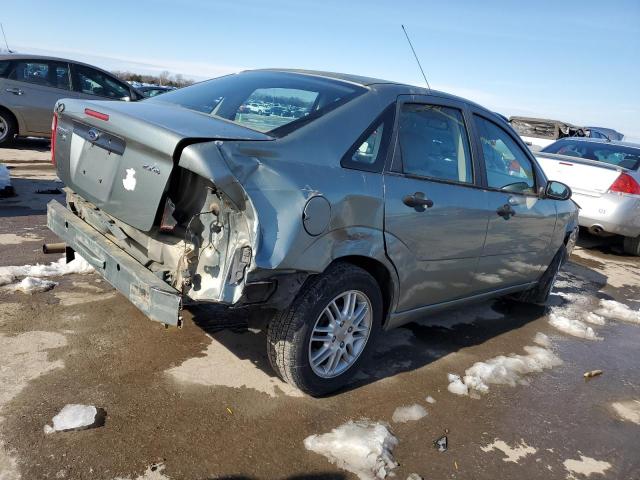 1FAFP34N46W171794 - 2006 FORD FOCUS ZX4 GRAY photo 3