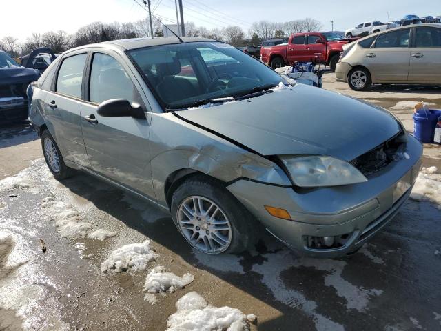 1FAFP34N46W171794 - 2006 FORD FOCUS ZX4 GRAY photo 4