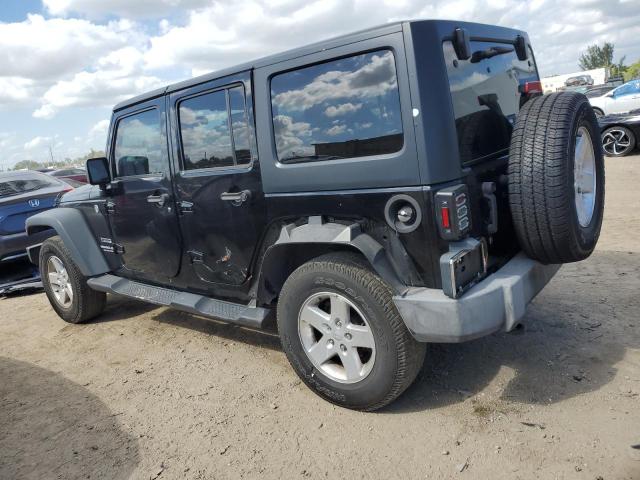 1C4HJWDG8GL242599 - 2016 JEEP WRANGLER U SPORT Чорний фото 2
