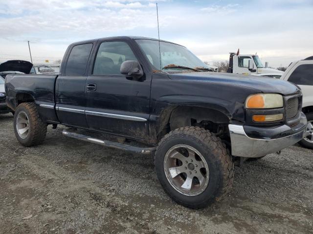 1GTEK19TX1E334740 - 2001 GMC SIERRA K1500 BLACK photo 4