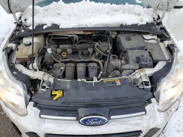 1FAHP3F21CL261249 - 2012 FORD FOCUS SE WHITE photo 11