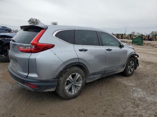 2HKRW5H30KH414029 - 2019 HONDA CR-V LX SILVER photo 3