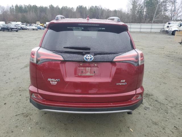 JTMJJREV3JD217093 - 2018 TOYOTA RAV4 HV SE MAROON photo 6