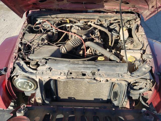 1J4BA5H10BL577669 - 2011 JEEP WRANGLER U SAHARA BURGUNDY photo 11