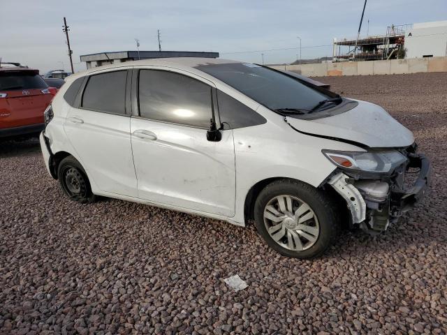 3HGGK5H55FM711190 - 2015 HONDA FIT LX WHITE photo 4