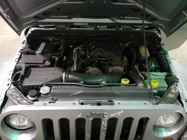 1C4BJWEG0DL666035 - 2013 JEEP WRANGLER U SAHARA SILVER photo 11