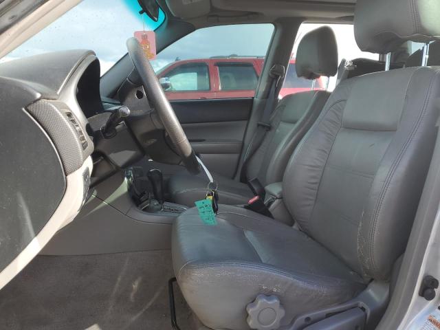 JF1SG65634H762904 - 2004 SUBARU FORESTER 2.5XS Серебристый фото 7