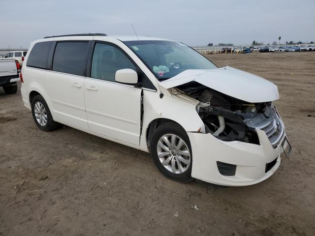 2C4RVABG2CR293662 - 2012 VOLKSWAGEN ROUTAN SE WHITE photo 4