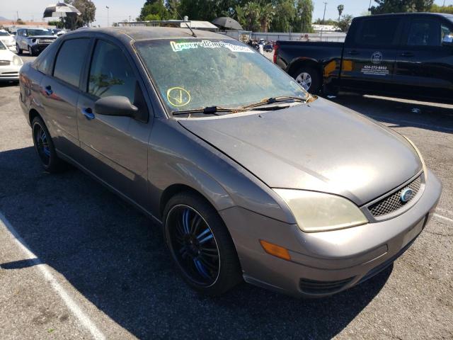1FAFP34N47W152311 - 2007 FORD FOCUS ZX4 GRAY photo 1