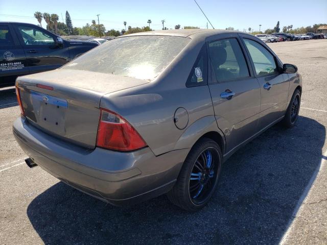 1FAFP34N47W152311 - 2007 FORD FOCUS ZX4 GRAY photo 4