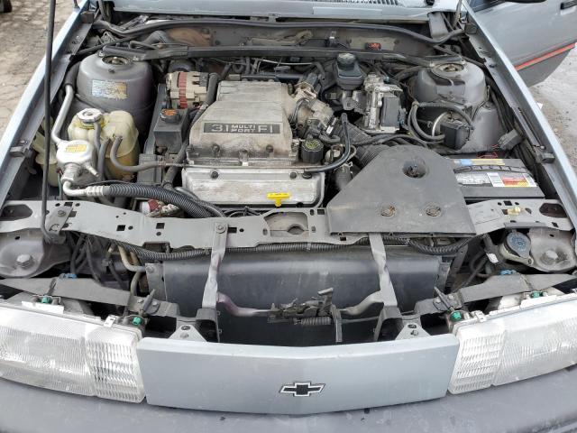 1G1JC84T4R7208197 - 1994 CHEVROLET CAVALIER GRAY photo 11