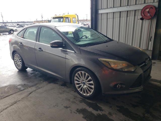 1FAHP3J21CL189539 - 2012 FORD FOCUS TITANIUM GRAY photo 4