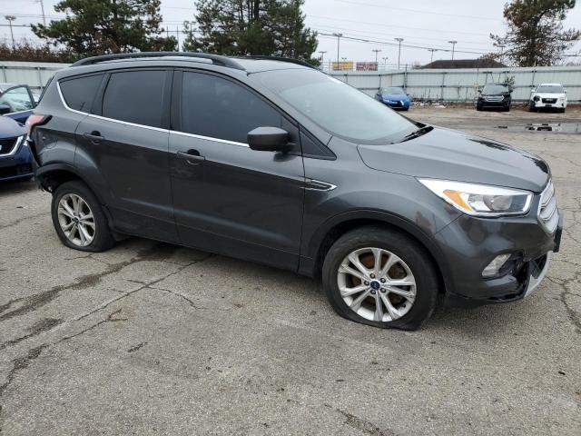 1FMCU9GD4JUD55984 - 2018 FORD ESCAPE SE GRAY photo 4