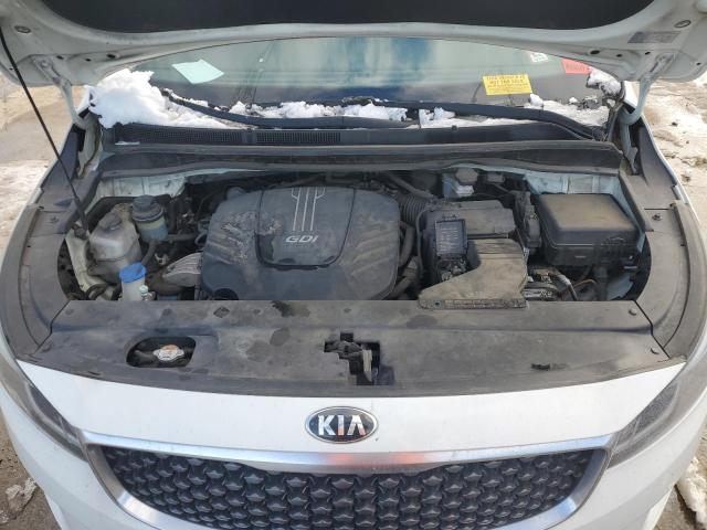 KNDMA5C18G6207193 - 2016 KIA SEDONA L WHITE photo 12