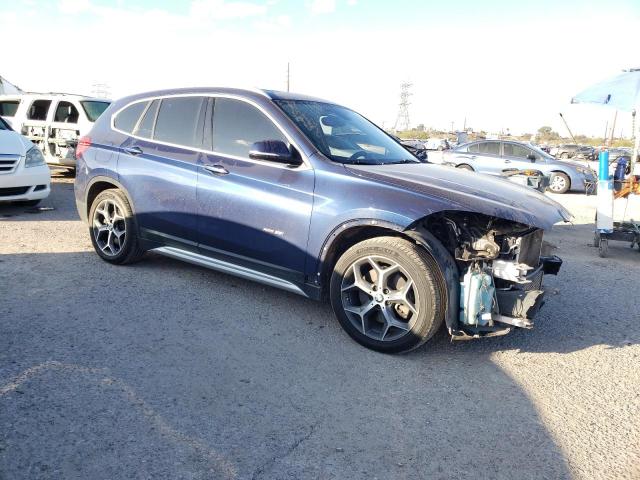 WBXHT3C34GP883980 - 2016 BMW X1 XDRIVE28I Синий фото 4