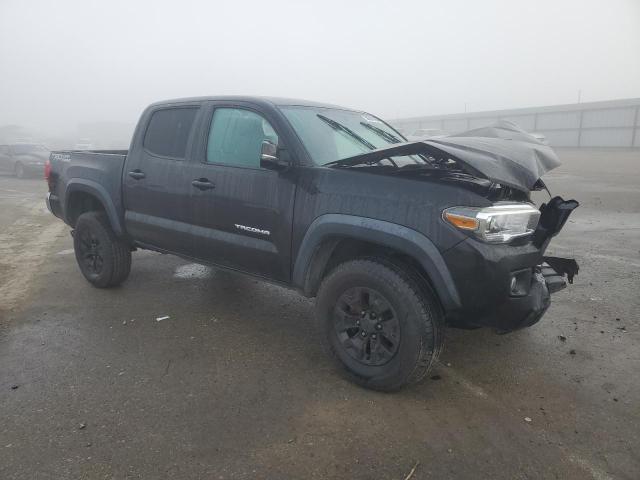 3TMAZ5CN9HM033666 - 2017 TOYOTA TACOMA DOUBLE CAB შავი ფოტო 4