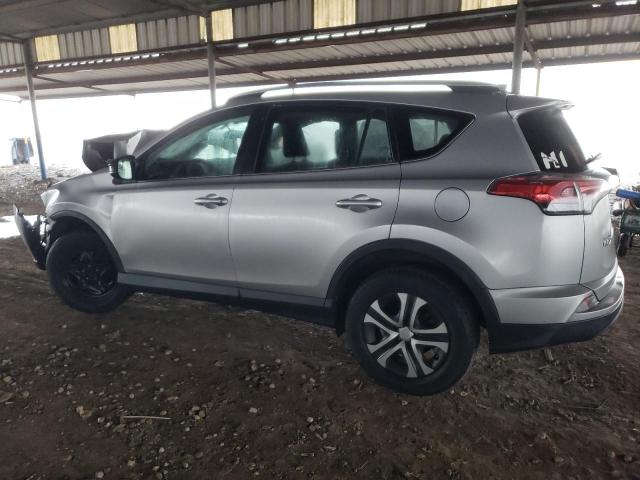 2T3ZFREV7GW300879 - 2016 TOYOTA RAV4 LE SILVER photo 2