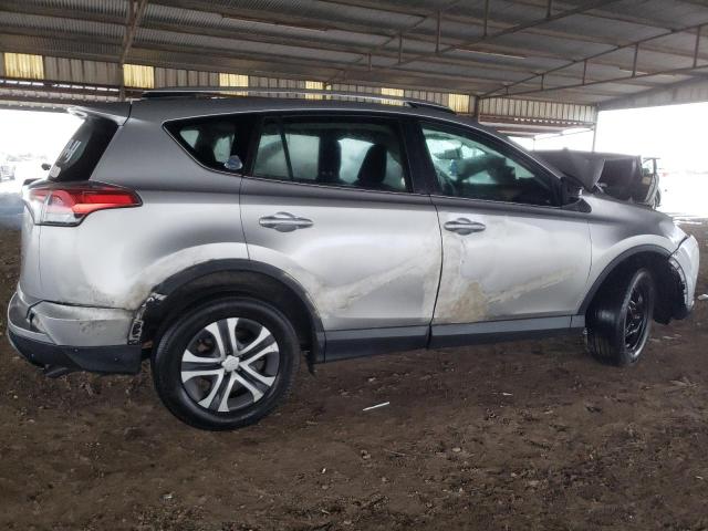 2T3ZFREV7GW300879 - 2016 TOYOTA RAV4 LE SILVER photo 3