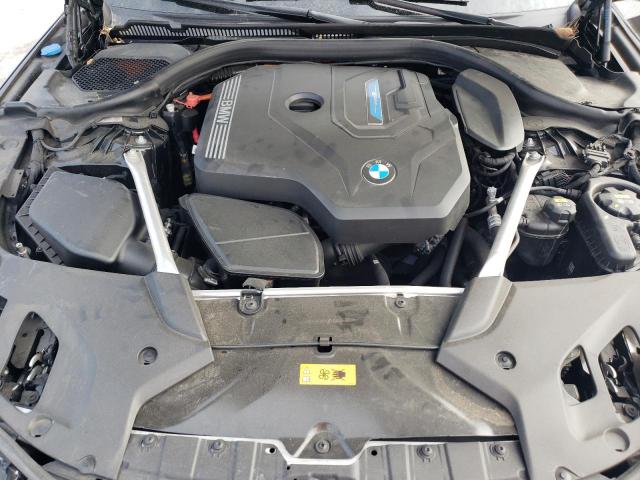 WBA13AG04PCL14795 - 2023 BMW 530E BLACK photo 11