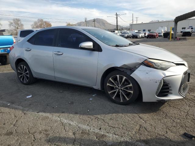 5YFBURHE0HP643743 - 2017 TOYOTA COROLLA L SILVER photo 4