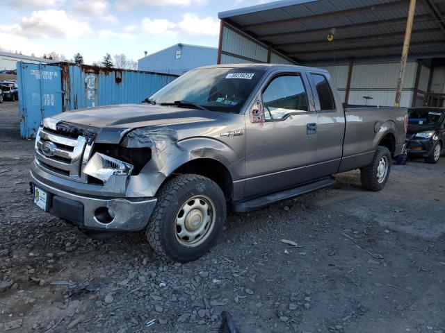 1FTVX1EV6AKC37206 - 2010 FORD F150 SUPER CAB GRAY photo 1