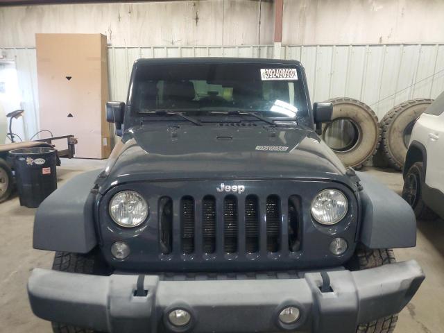 1C4BJWDG8GL323771 - 2016 JEEP WRANGLER U SPORT ნაცრისფერი ფოტო 5