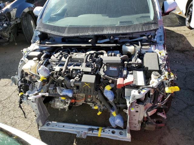 JTDKARFP5J3096559 - 2018 TOYOTA PRIUS PRIM Weiß Foto 11