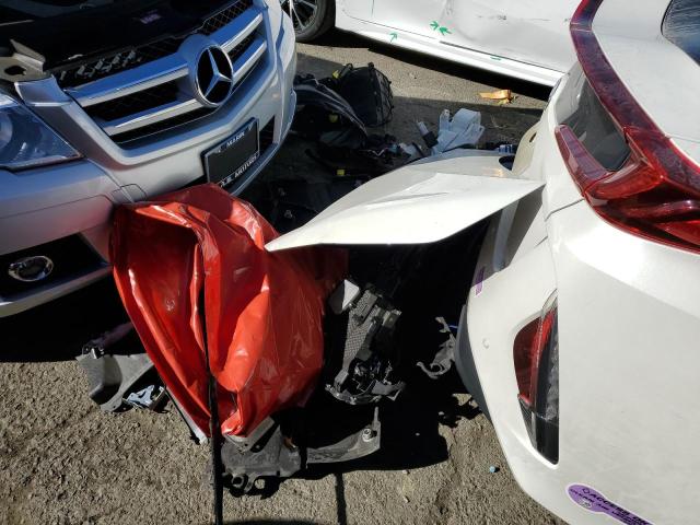 JTDKARFP5J3096559 - 2018 TOYOTA PRIUS PRIM Weiß Foto 12