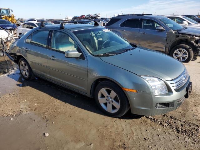 3FAFP07Z86R159518 - 2006 FORD FUSION SE GREEN photo 4