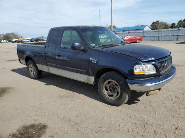 1FTRX17L82NB15749 - 2002 FORD F150 BLUE photo 4