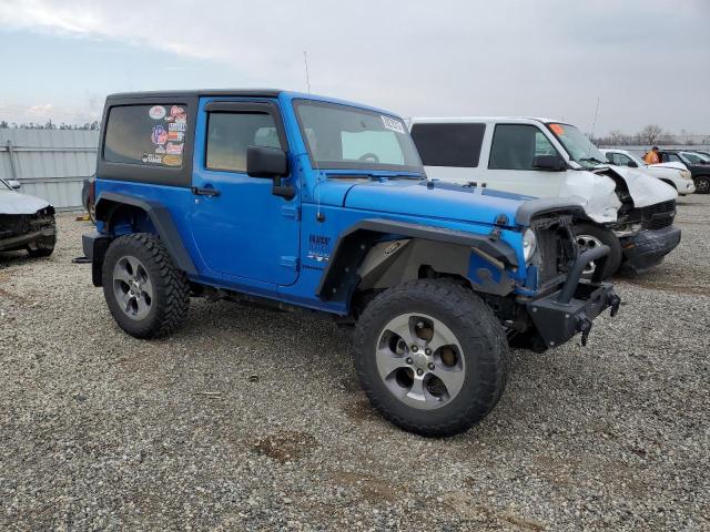 1C4AJWBG6GL185646 - 2016 JEEP WRANGLER SAHARA BLUE photo 4