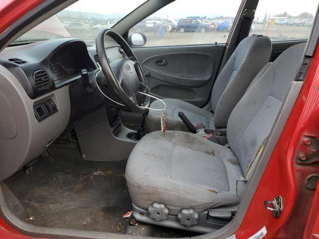 KNADC123726145877 - 2002 KIA RIO RED photo 7