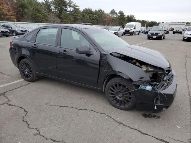 1FAHP3GN1BW132112 - 2011 FORD FOCUS SES BLACK photo 4