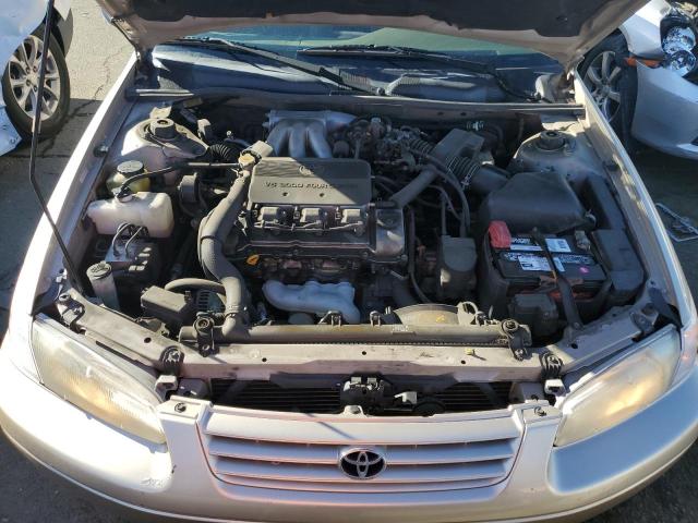 JT2BF28K6X0152232 - 1999 TOYOTA CAMRY LE TAN photo 11