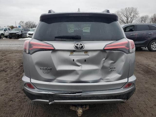 JTMRFREV9JJ249696 - 2018 TOYOTA RAV4 ADVENTURE SILVER photo 6