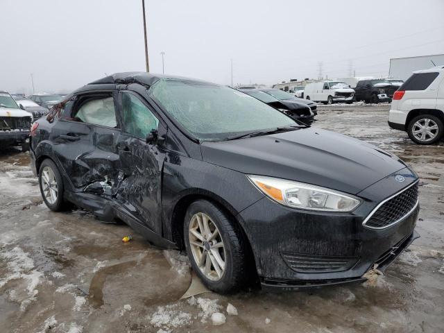 1FADP3F23FL229874 - 2015 FORD FOCUS SE BLACK photo 4