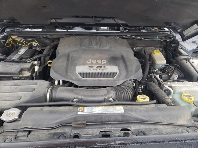 1C4BJWEG3CL130470 - 2012 JEEP WRANGLER U SAHARA BLACK photo 11