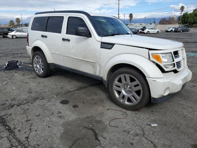 1D4PT4GK4AW163241 - 2010 DODGE NITRO HEAT WHITE photo 4