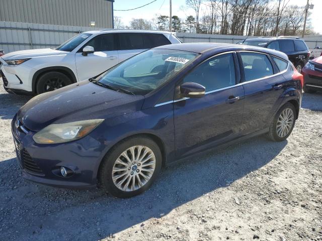 1FAHP3N25CL134277 - 2012 FORD FOCUS TITANIUM BLUE photo 1