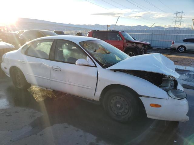 1FALP52U1TG185697 - 1996 FORD TAURUS GL WHITE photo 4