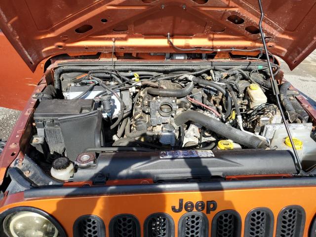 1J4AA2D10BL555865 - 2011 JEEP WRANGLER SPORT ORANGE photo 12