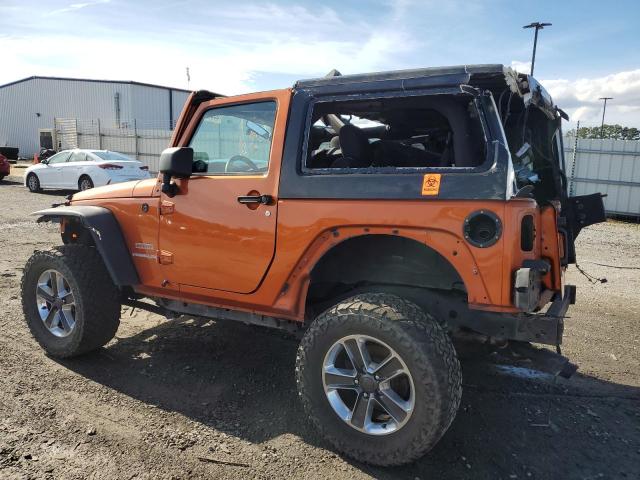 1J4AA2D10BL555865 - 2011 JEEP WRANGLER SPORT ORANGE photo 2