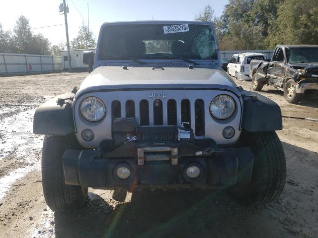 1C4BJWDG3GL137491 - 2016 JEEP WRANGLER U SPORT ვერცხლისფერი ფოტო 5